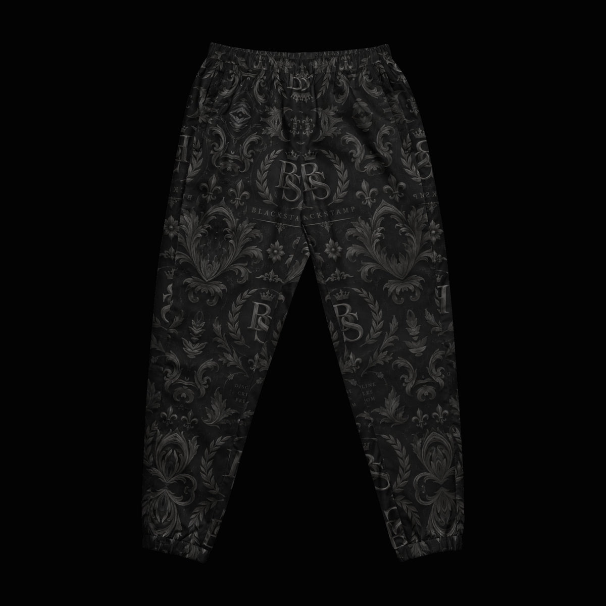 BlackStamp©™ Track Pants 003 — original product on a deep-black studio background.