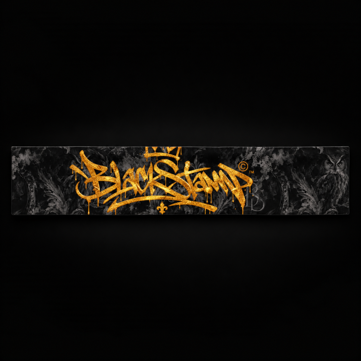 BlackStamp©™ Headband 001, gold wordmark, front product view on a dark black studio background