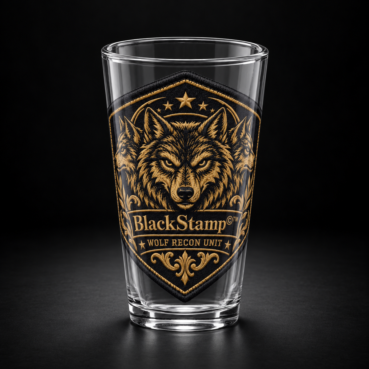 BlackStamp©™ Pint Glass 001, wolf recon, front product view on a dark black studio background