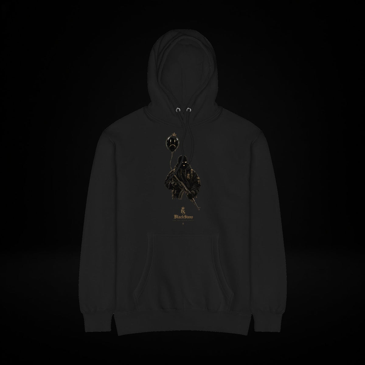 BlackStamp©™ Hoodie 1 — black hoodie with its original gold artwork on a deep-black studio background.